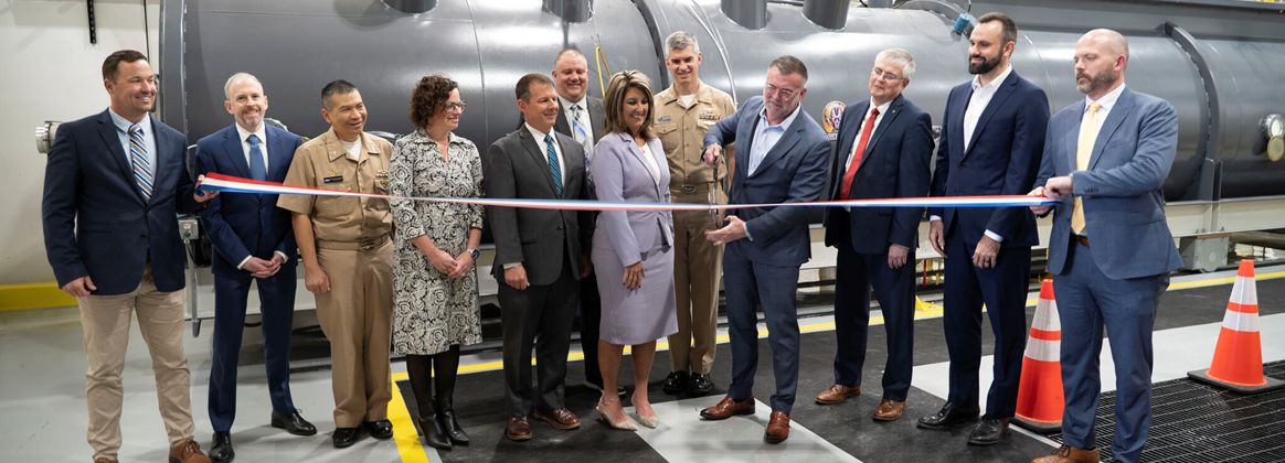 NSWC Crane hosted government and industry partners for the Trusted and Assured Microelectronics (T&AM) Flash X-Ray (FXR) “Shockwave” Ribbon Cutting Event. 